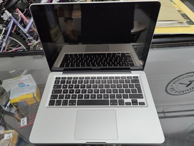 Lot 161 - Apple MacBook pro laptop no charger fully reset