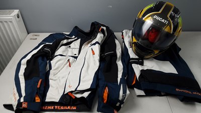 Lot 39 - Ducati motorcycle helmet with suit