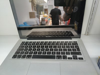 Lot 69 - Apple MacBook pro laptop no charger fully reset