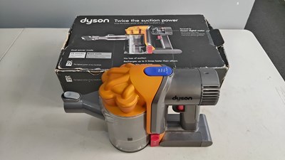 Lot 34 - Dyson dc34 Cordless vacuum with charger and accessories