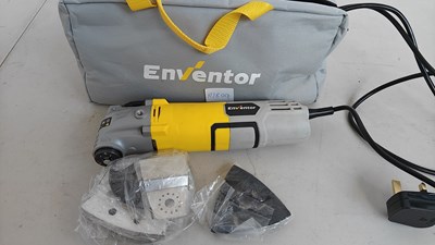 Lot 16 - multi tool with tools