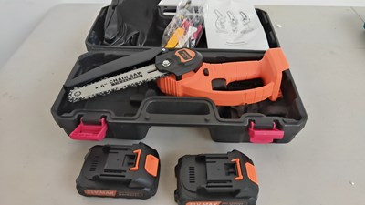 Lot 27 - Mini chainsaw in case with batteries, charger and accessories