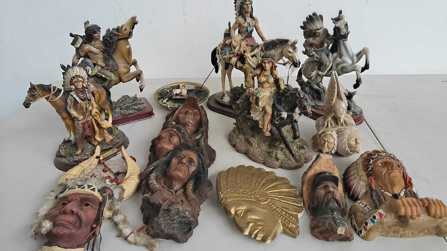 Lot 61 - Collection of native American statues