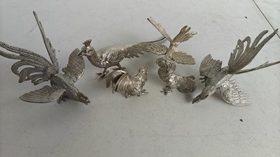 Lot 109 - Selection of cockerel figures