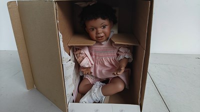 Lot 101 - Pink dress baby collectable doll