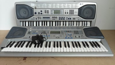 Lot 178 - 2 Cassio keyboards with one power cable tested working