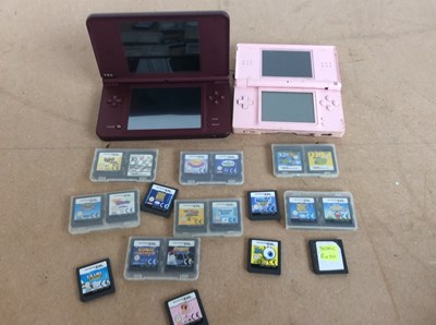 Lot 93 - 2 Nintendo ds hand held gaming devices inc qty of games