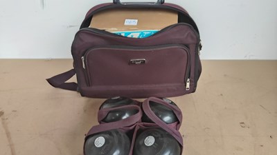 Lot 19 - Qty of boules in suitcase