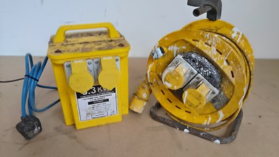 Lot 56 - 110v transformer with extension reel