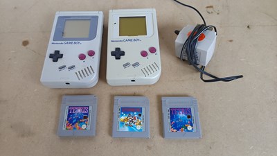 Lot 95 - 2 game boys with games and charger untested