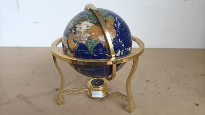 Lot 129 - Gemstone decorative world globe on stand