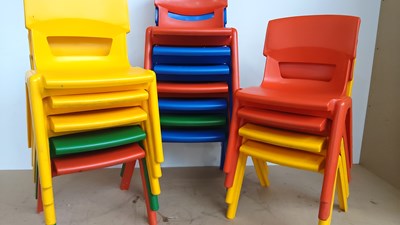 Lot 210 - 16 kids colourful plastic stacking chairs