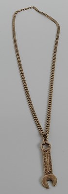 Lot 30 - 9ct Gold Chain and spanner pendent 29.89gram, est £820-£880