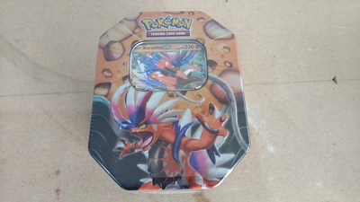 Lot 113 - Pokémon trading cards in tin new and sealed