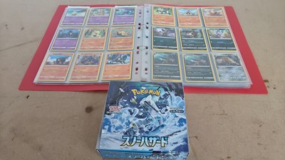 Lot 103 - Collection of Pokémon cards in binder and box of opened booster packs