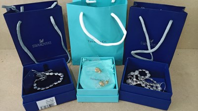 Lot 144 - Bracelet, necklace and earrings bearing Tiffany and Swarovski logos