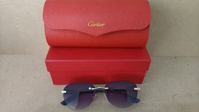 Lot 138 - Cartier bearing sunglasses
