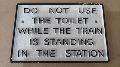 Lot 73 - Do not use the toilet while the train is standing in the station