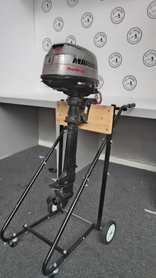 Lot 76 - Mariner four stroke 6.0 boat motor on wheeled stand tested working