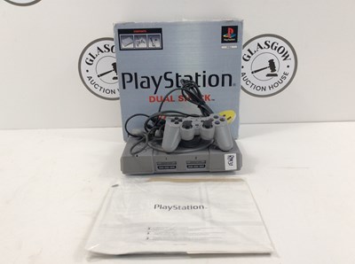 Lot 99 - A PlayStation One In Original Box With Original Instructions