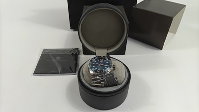 Lot 135 - Gents watch bearing Tag Heuer logos in display case