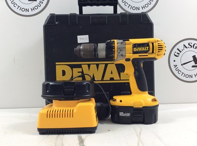 Lot 28 - Dewalt drill with 2 battery’s with charger working