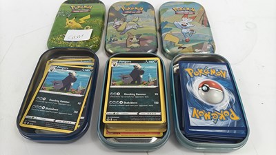 Lot 111 - 3 tins Pokémon cards