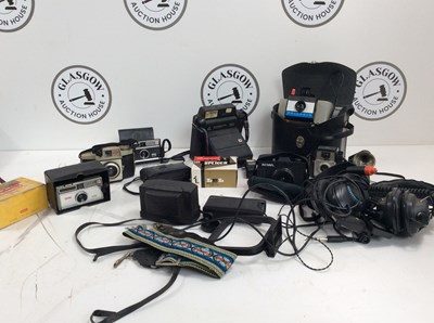 Lot 188 - 2 boxes of vintage camera equipment