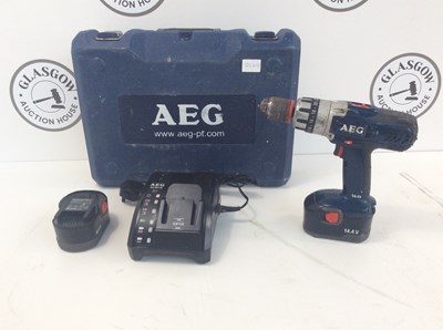 Lot 236 - Aeg hammer drill 2x battery’s charger in case Tested working