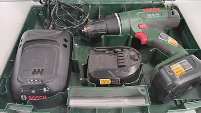 Lot 153 - Bosch drill batteries and charger in case