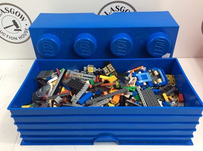 Lot 1 - Blue Lego brick with Lego insife