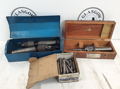 Lot 12 - Blue metal tool box with specialist drill bits and spanners