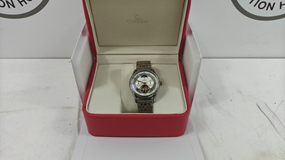 Lot 95 - Watch bearing omega logos in display box