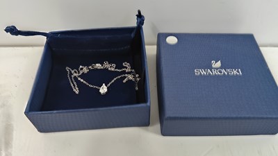 Lot 93 - Necklace bearing Swarovski logos