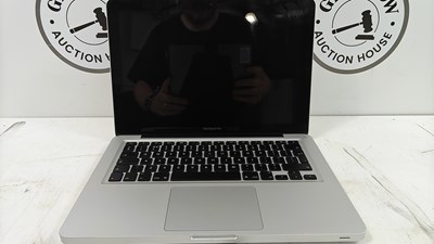 Lot 62 - MacBook pro laptop fully reset no charger