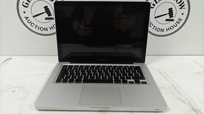 Lot 70 - MacBook pro laptop fully reset no charger