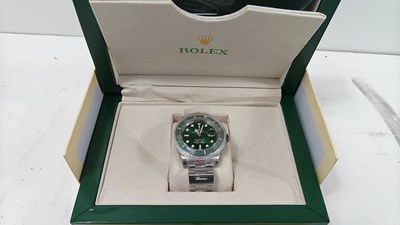 Lot 116 - Watch bearing rolex logo in display box bix
