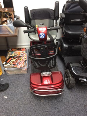 Lot 57 - Red mobility scooter with key and charger flat tyre