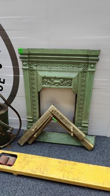 Lot 135 - Antique cast metal fire surround in pale green finish with accessories