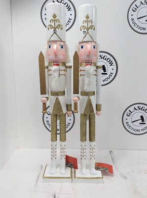 Lot 223 - A Pair Of White Nutcrackers