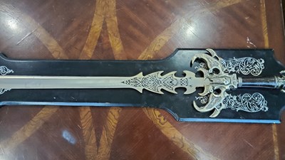 Lot 156 - Mounted decorative sword with heavy hilt