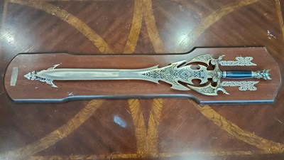 Lot 155 - Mounted decorative sword with fang style hilt