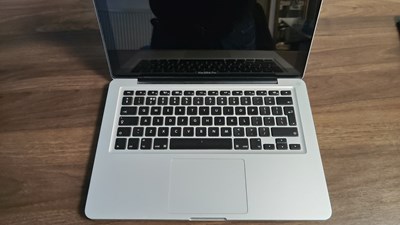 Lot 71 - MacBook pro laptop fully reset with no charger