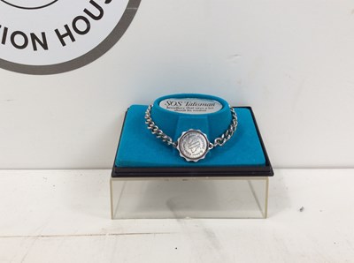 Lot 173 - SOS Talisman Bracelet