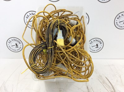 Lot 59 - Pile of 110v yellow extension leads
