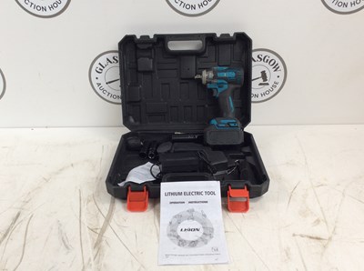 Lot 11 - Impact Drill With Charger, Battery & Sockets