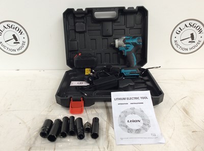 Lot 34 - Impact Drill With Battery, Charger & Sockets
