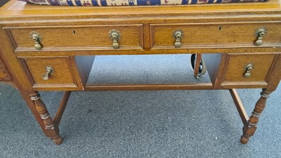 Lot 251 - Oak leather top vintage desk
