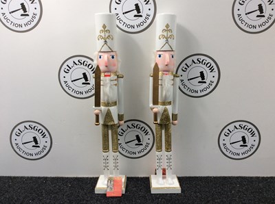 Lot 104 - Pair Of White Nutcrackers With Gold Glitter