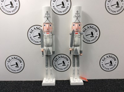Lot 94 - Pair Of White Nutcrackers With Silver Glitter